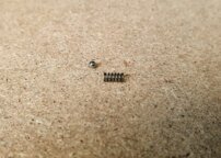 Pružinka prepínača streľby AR